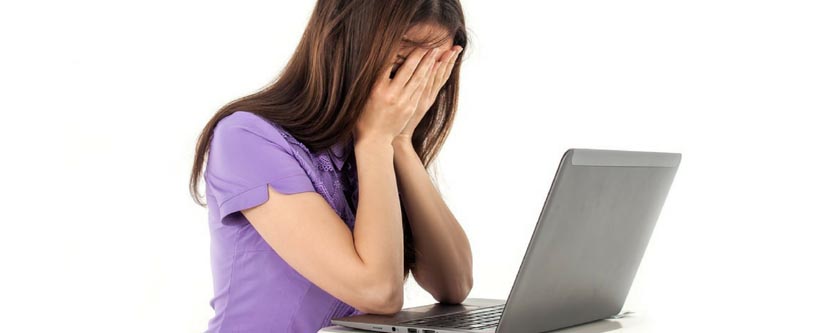 woman covering her face because of brand safety concerns