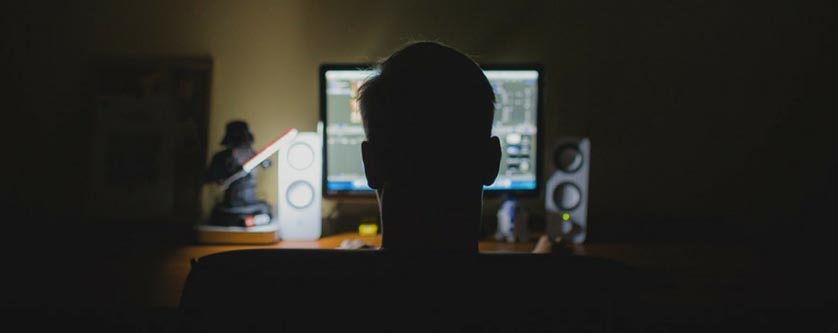 sneaky guy committing ad fraud