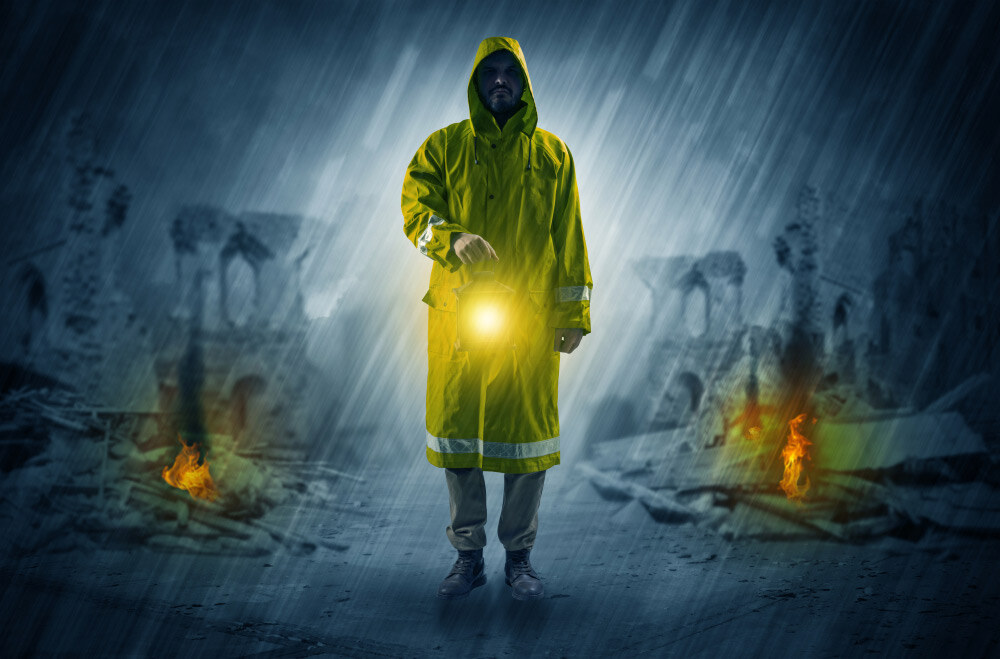 person with lamp in rain